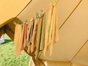 Festival flannels hanging in a tent on a washing line