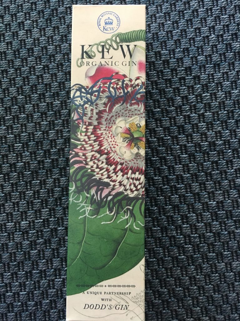 Box containing Kew Gin. Box is highly decorated with flowers.