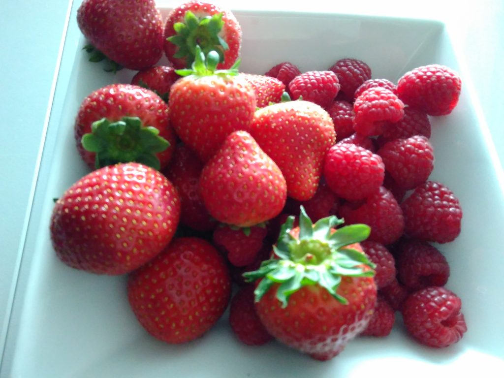 Bowl of raspberries and strawberries