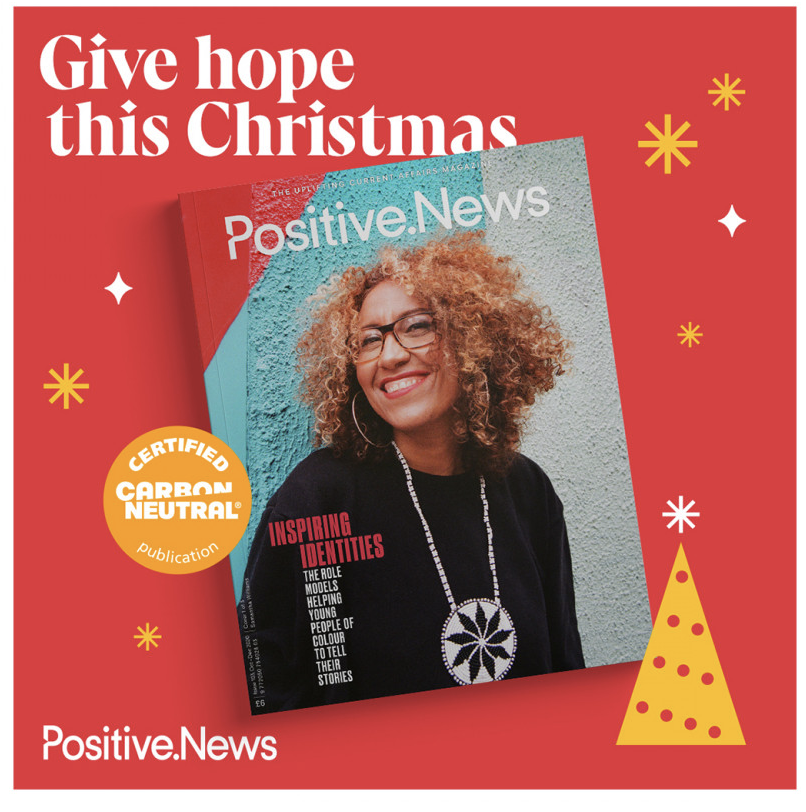The cover of a magazine. Above the cover the text "give hope this Christmas". Christmas tree cartoon and snowflakes around it. Advert for buying the magazine as a present.