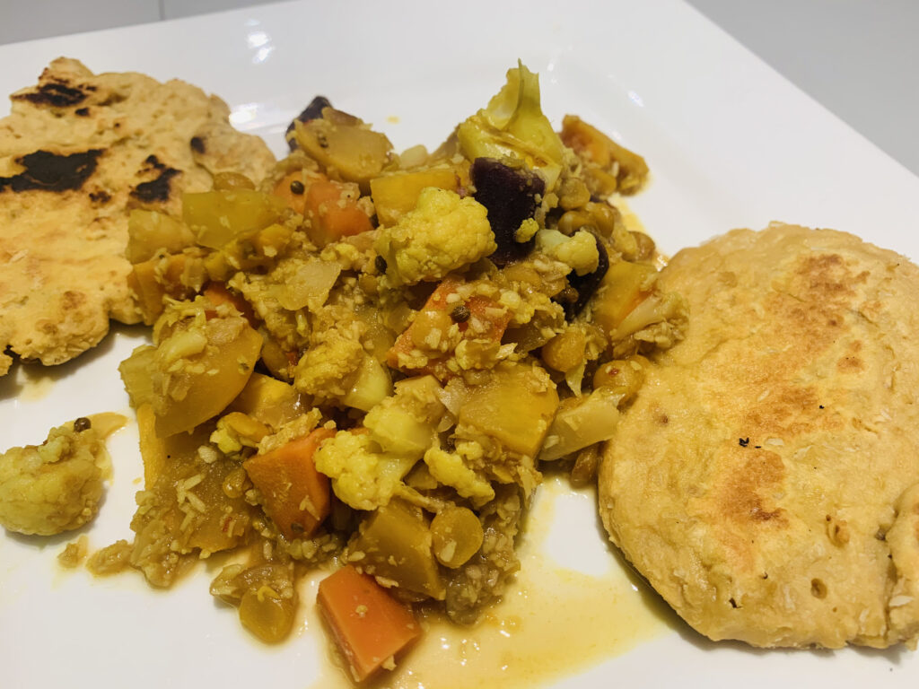A vegetable and lentil curry with roti
