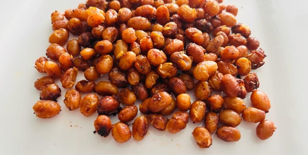 Roasted soya beans on a white plate