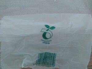 Home compostable bag with home compostable logo